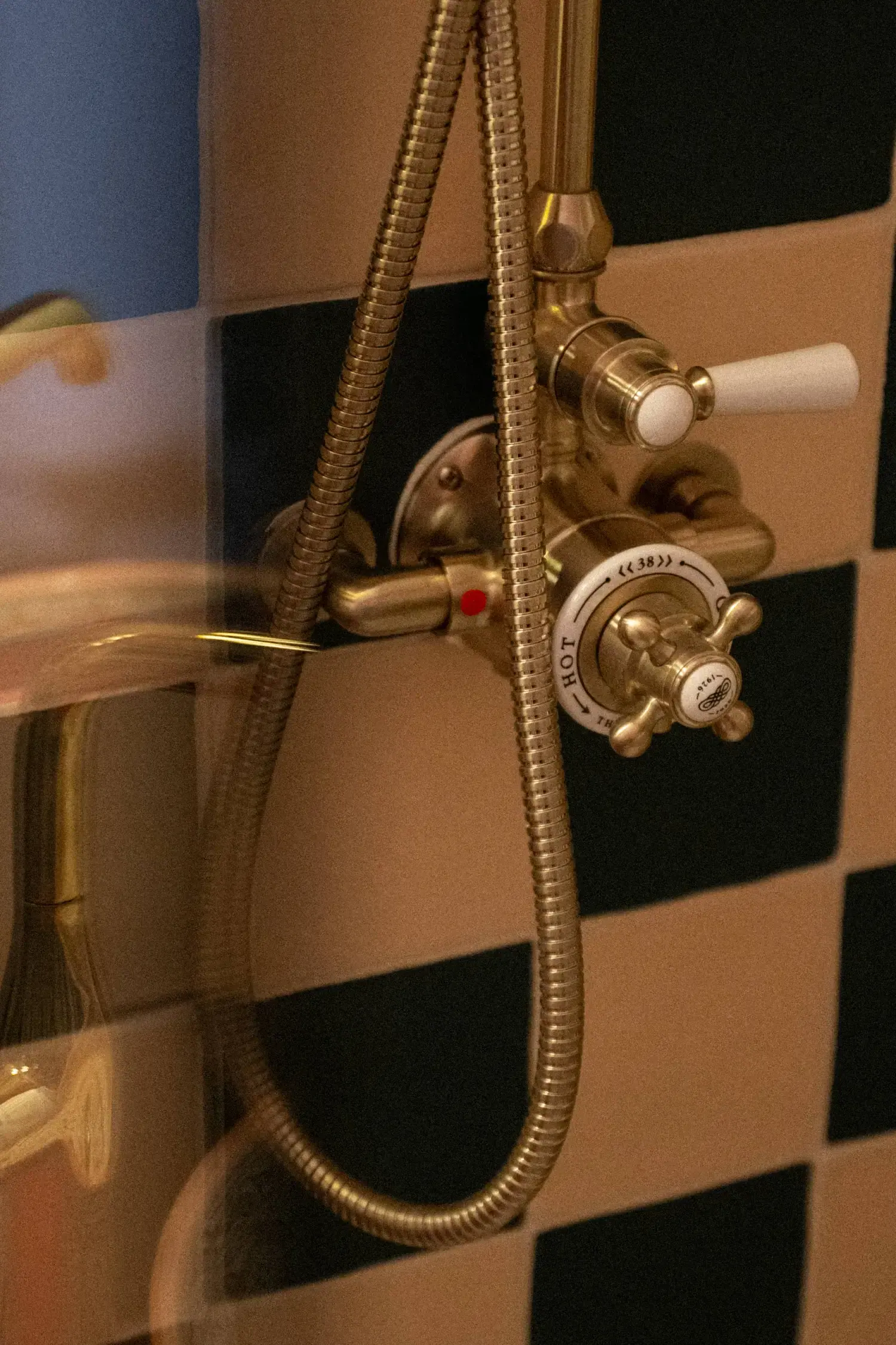 Flagey — colourful basin and gold taps